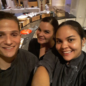 3 employees smiling