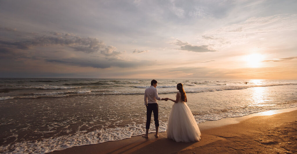bride and groom on beach