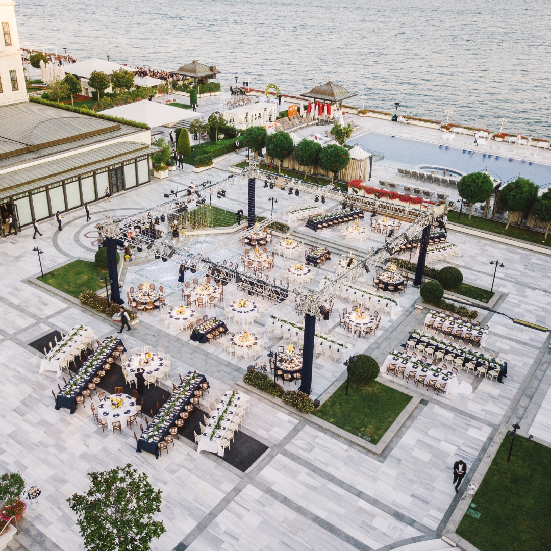 wedding party seen from above, chairs and tables outside